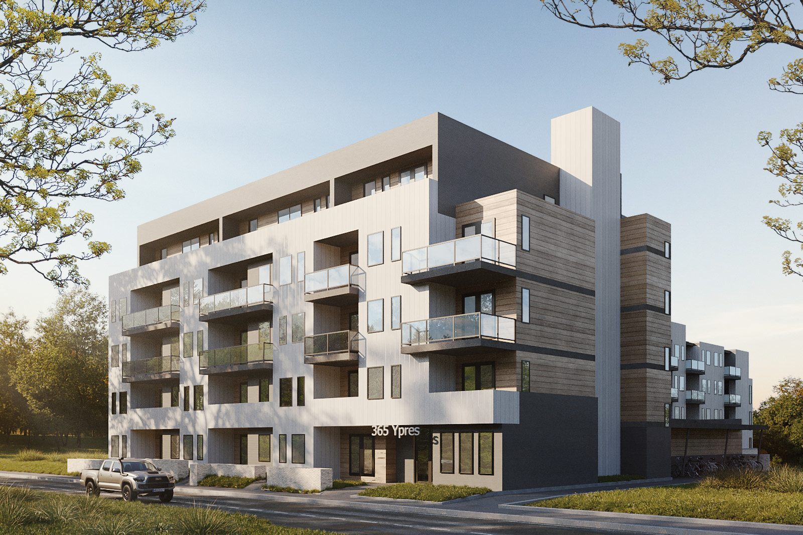 Mid-rise architectural rendering, grey building with patio units
